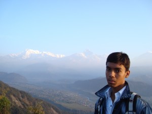 Nephew Anik, on top of Sarangkot Mountain. Mighty Annapurna is behind.